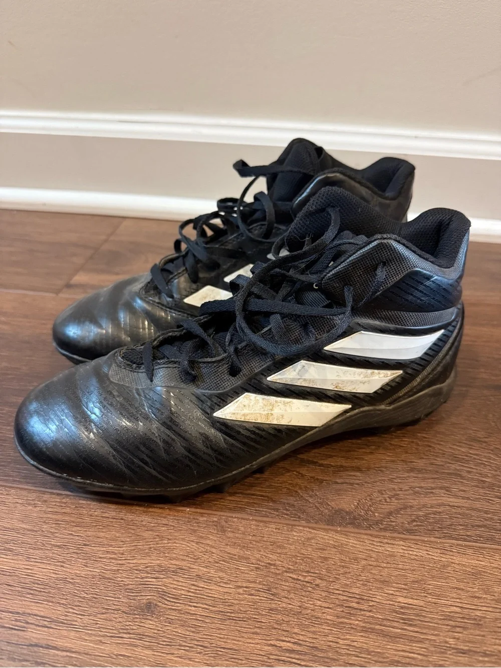 Adidas Black Football Cleats with White Stripes